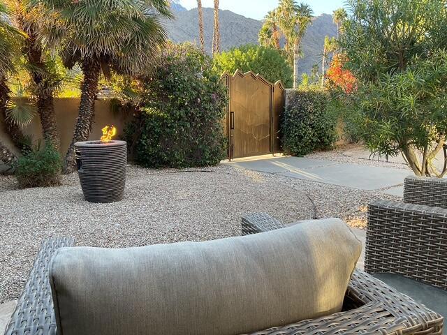 view of patio featuring a mountain view and cooling unit