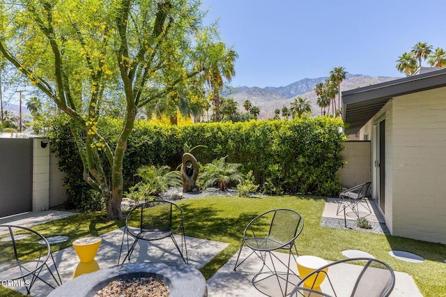 view of patio / terrace featuring a mountain view