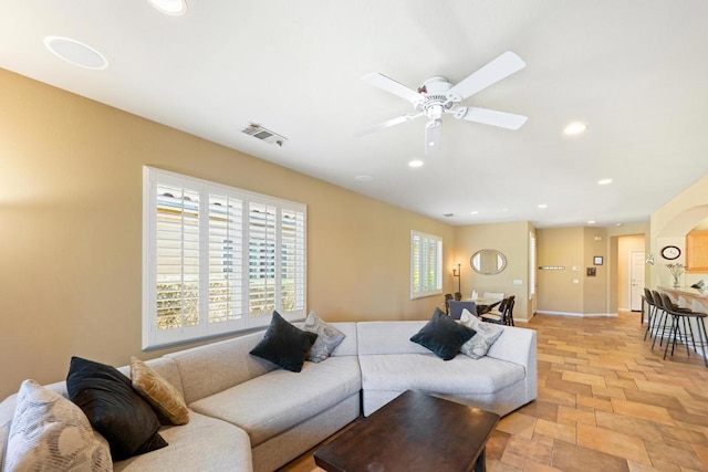 living room featuring ceiling fan