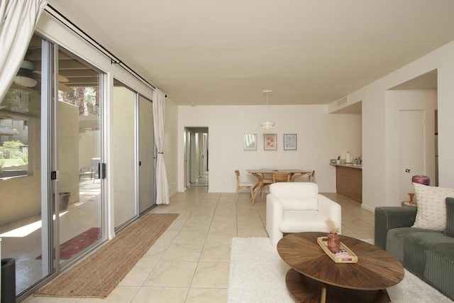 living room with light tile patterned floors