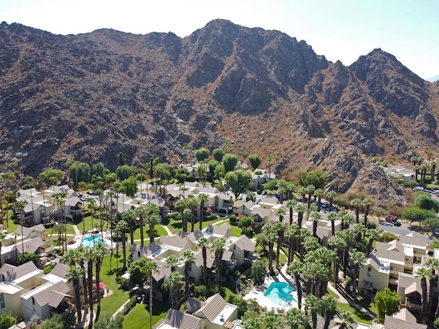 birds eye view of property featuring a mountain view