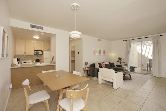 view of tiled dining space