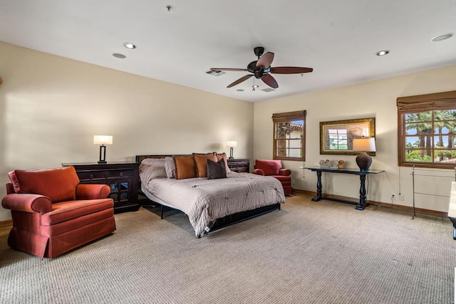 carpeted bedroom with ceiling fan