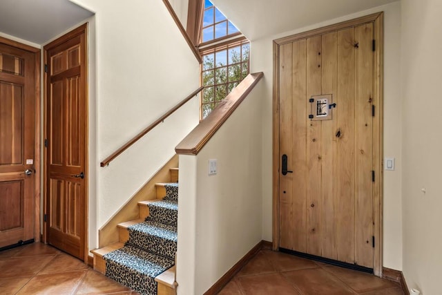 entryway featuring tile patterned flooring