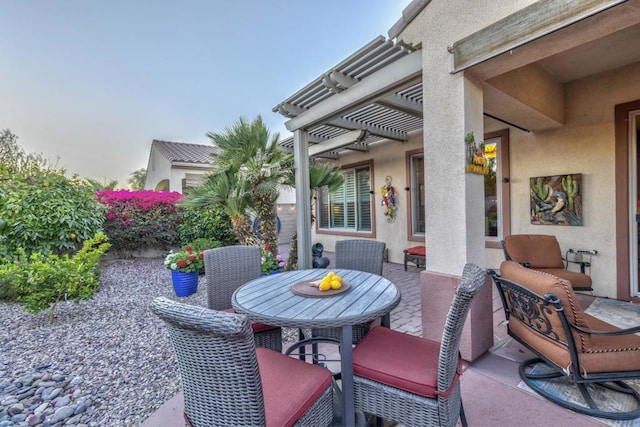 view of patio featuring a pergola