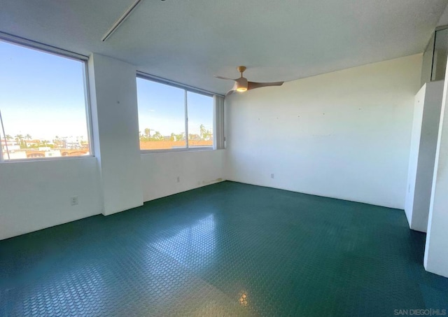 spare room featuring ceiling fan