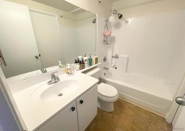 full bathroom with shower / bathing tub combination, vanity, toilet, and tile patterned floors