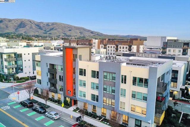 exterior space featuring a mountain view