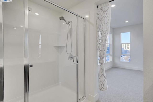 bathroom with walk in shower