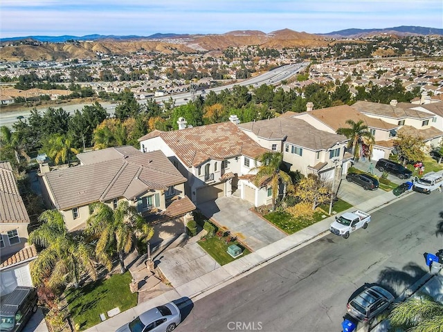 aerial view featuring a mountain view and a residential view