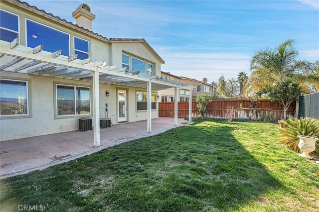 view of yard with a patio, a fenced backyard, and a pergola