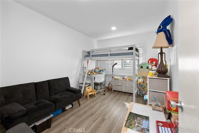 bedroom featuring light wood-type flooring