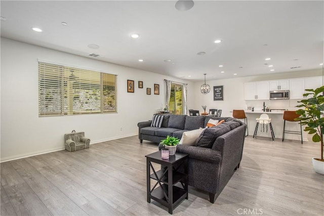 living room with light wood-type flooring