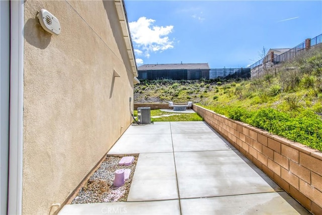 view of patio featuring central air condition unit