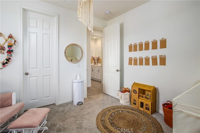 interior space with light colored carpet and a notable chandelier