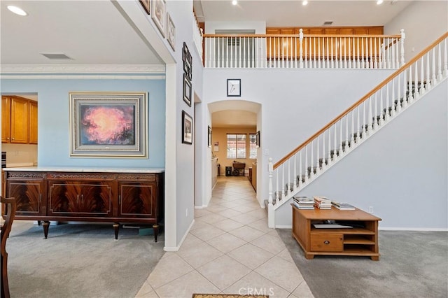 entrance foyer featuring light tile patterned floors