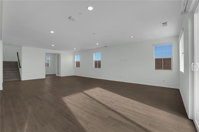 empty room with hardwood / wood-style floors