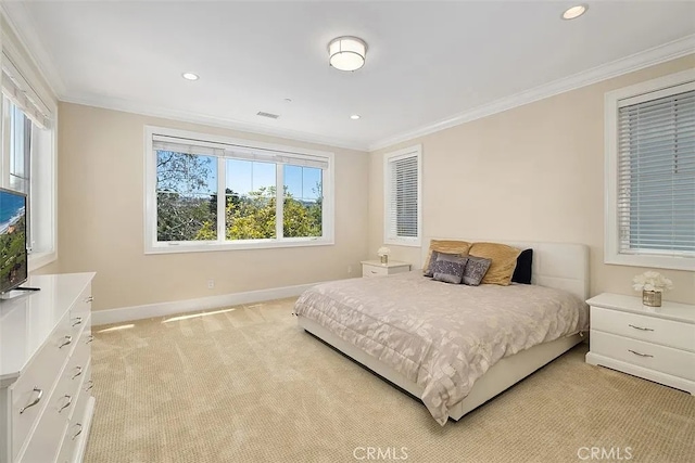 carpeted bedroom featuring crown molding