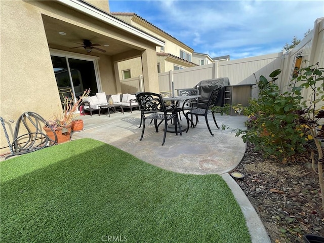 view of patio / terrace with ceiling fan and an outdoor hangout area