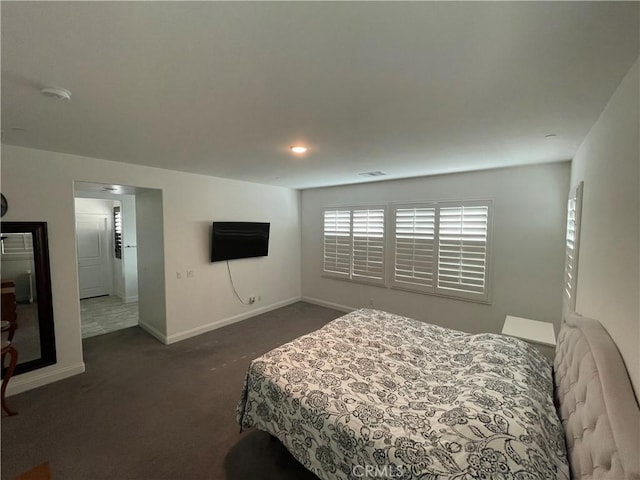24445 Paxton Ln, Lake Elsinore, CA 92532 - bedroom featuring baseboards, visible vents, and dark colored carpet