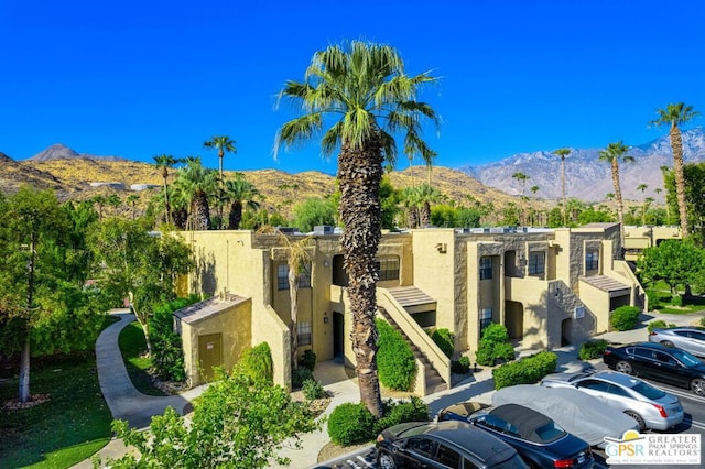 view of building exterior with a mountain view