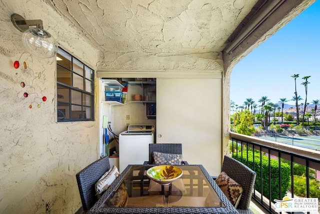 balcony with washer / clothes dryer