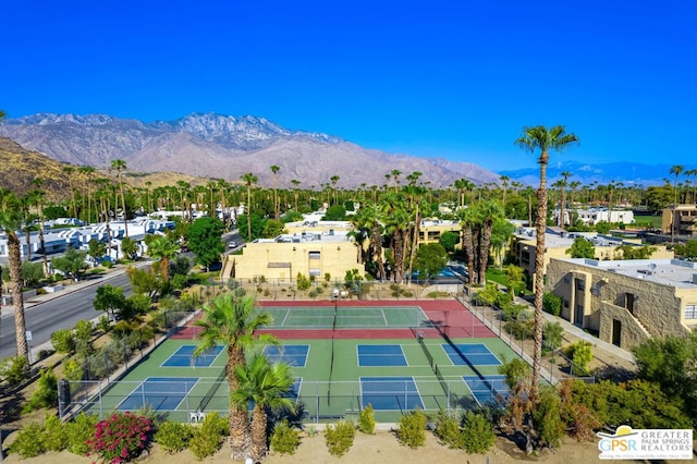 birds eye view of property featuring a mountain view