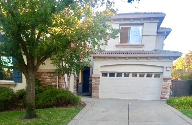 view of front of house with a garage