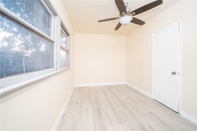 unfurnished room featuring ceiling fan and light hardwood / wood-style flooring