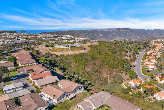 bird's eye view featuring a residential view and a mountain view