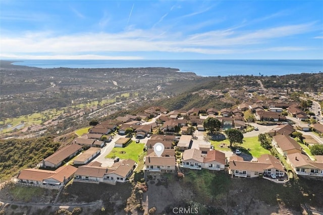 bird's eye view with a water view and a residential view