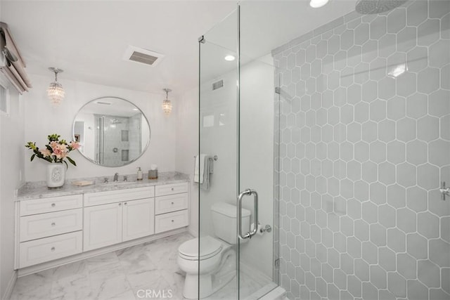 full bathroom with visible vents, toilet, marble finish floor, vanity, and a shower stall