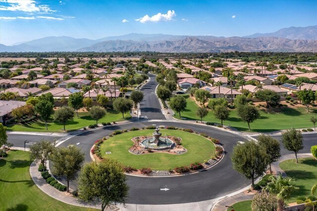 drone / aerial view featuring a mountain view