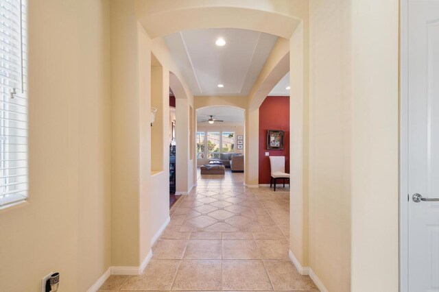 corridor with light tile patterned floors