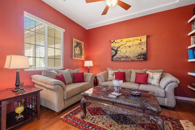 living room with ceiling fan and wood-type flooring