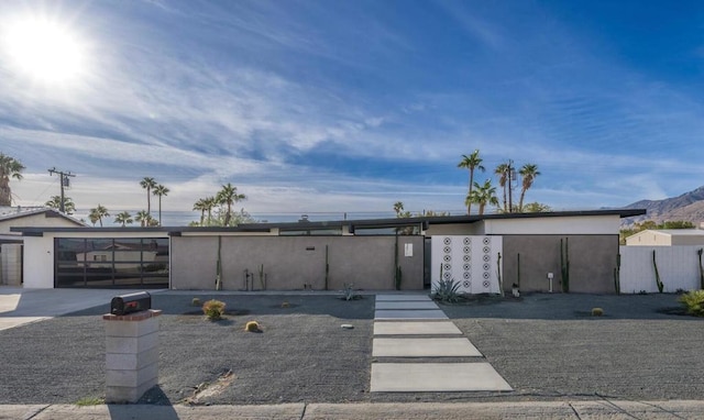 view of front of house with a mountain view