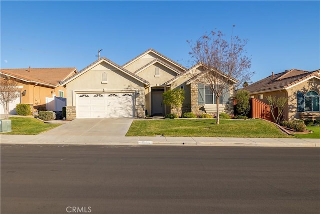 single story home featuring a front yard and a garage