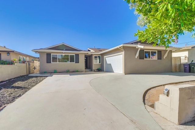 single story home with a garage