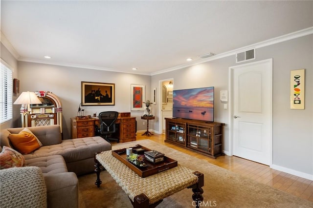 living room with crown molding and wood-type flooring