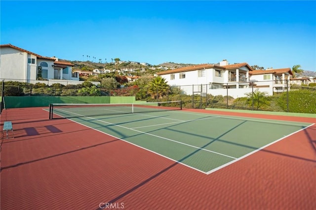 view of sport court featuring basketball court