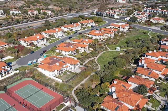 birds eye view of property with a residential view