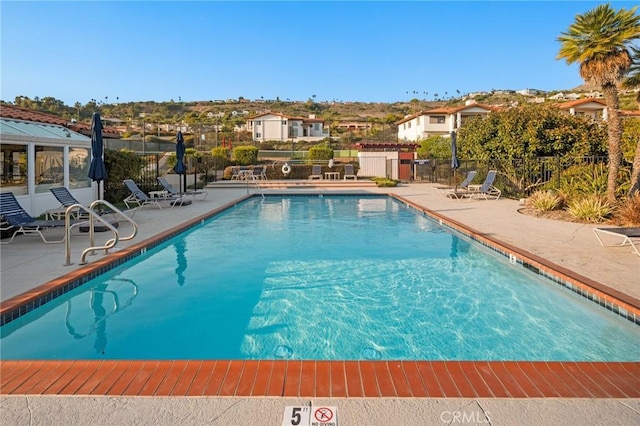 view of pool with a patio