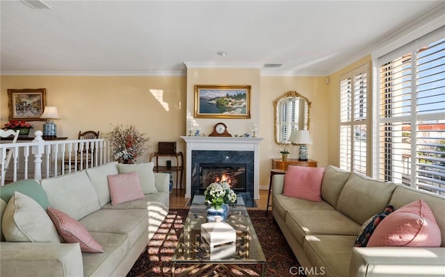 living room with ornamental molding