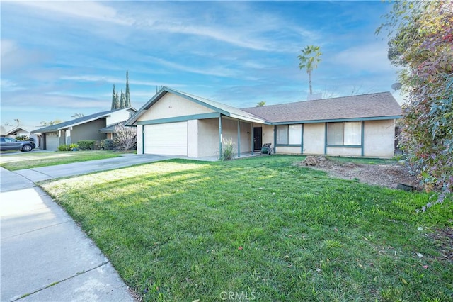 single story home featuring a garage and a front lawn