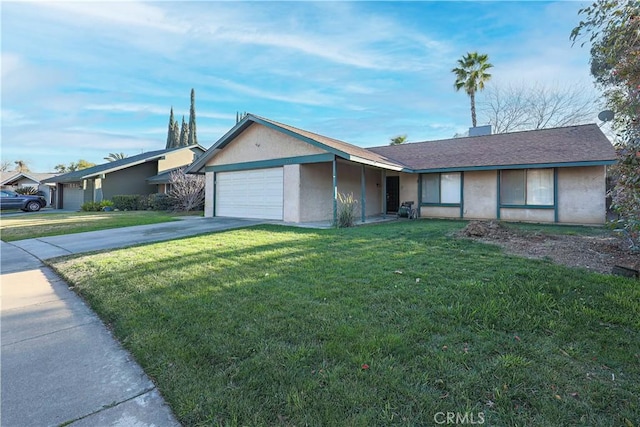 ranch-style home with a front yard and a garage