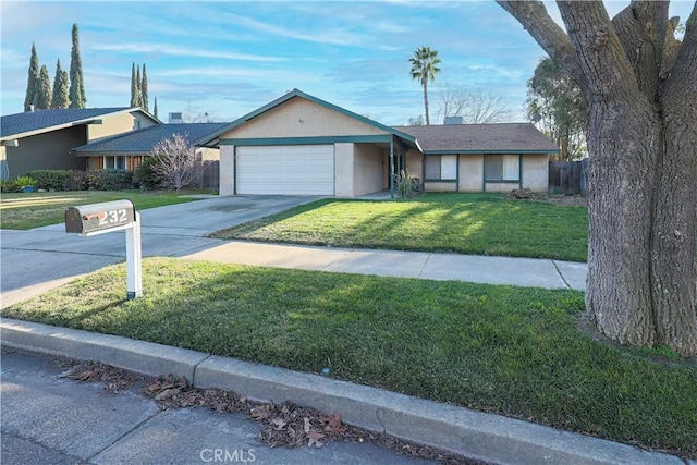 ranch-style house with a garage and a front yard