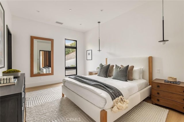 bedroom featuring light hardwood / wood-style flooring