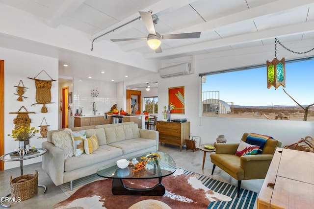 living room featuring sink, a wealth of natural light, concrete flooring, and a wall mounted AC