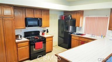 kitchen featuring black appliances