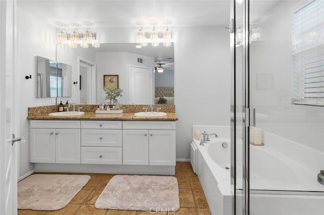 bathroom featuring separate shower and tub, ceiling fan, and vanity